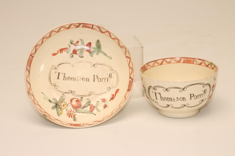 A DOCUMENTARY CREAMWARE TEABOWL AND SAUCER Image