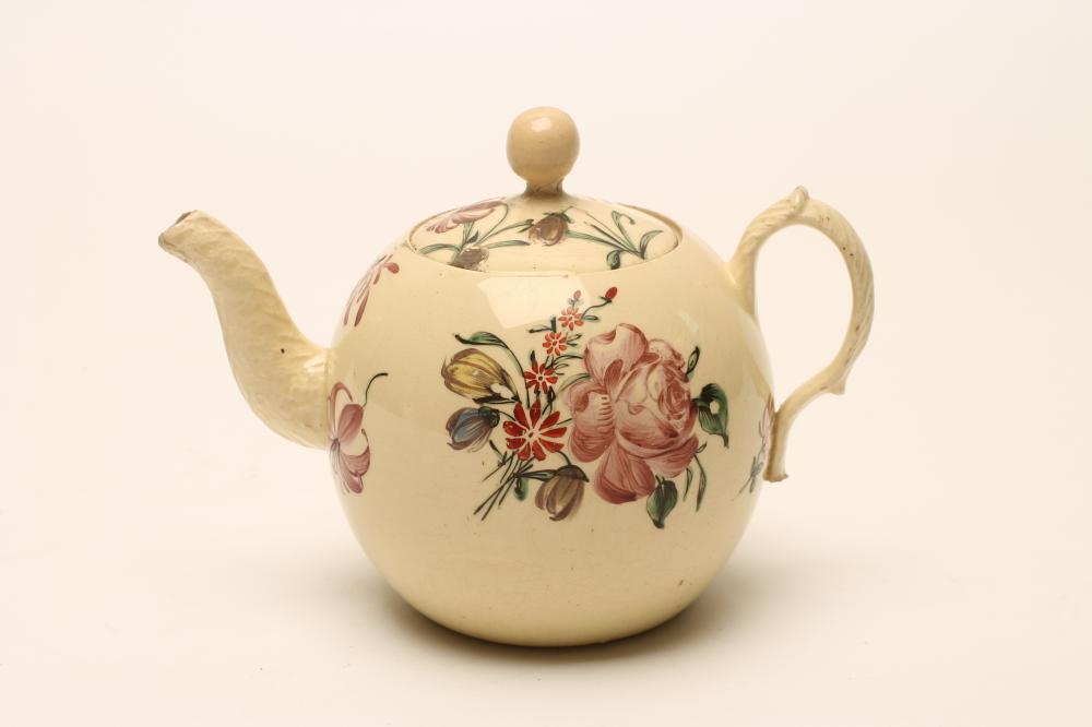 A CREAMWARE TEAPOT AND COVER Image