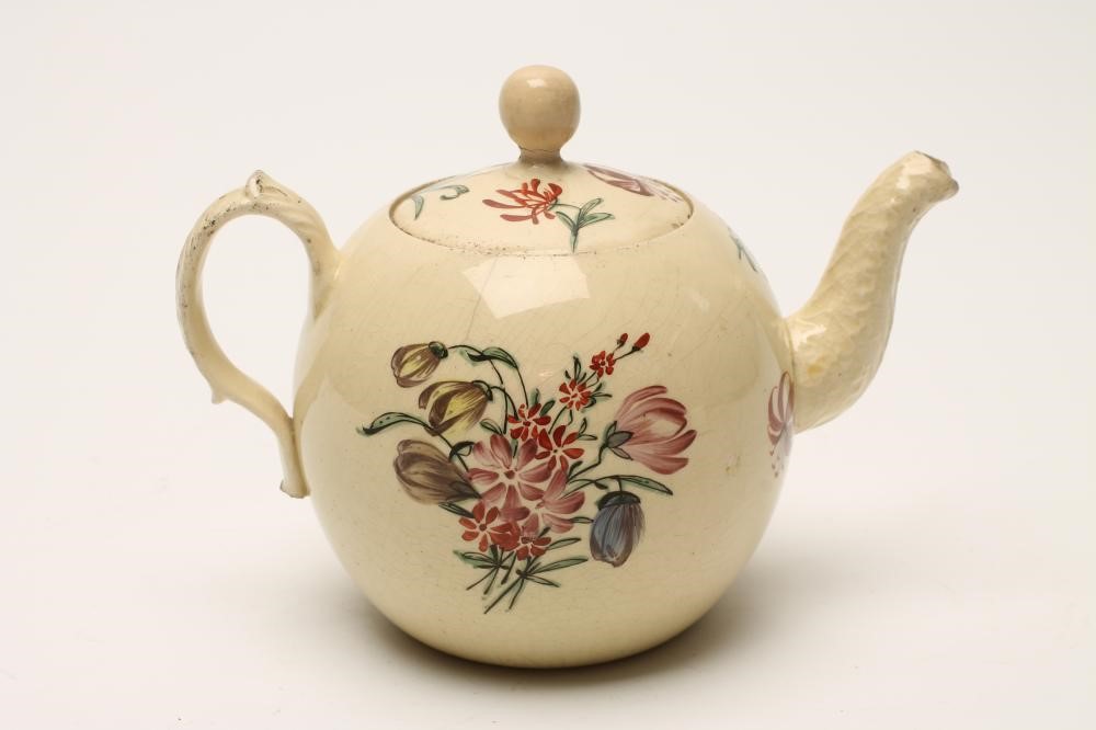 A CREAMWARE TEAPOT AND COVER Image