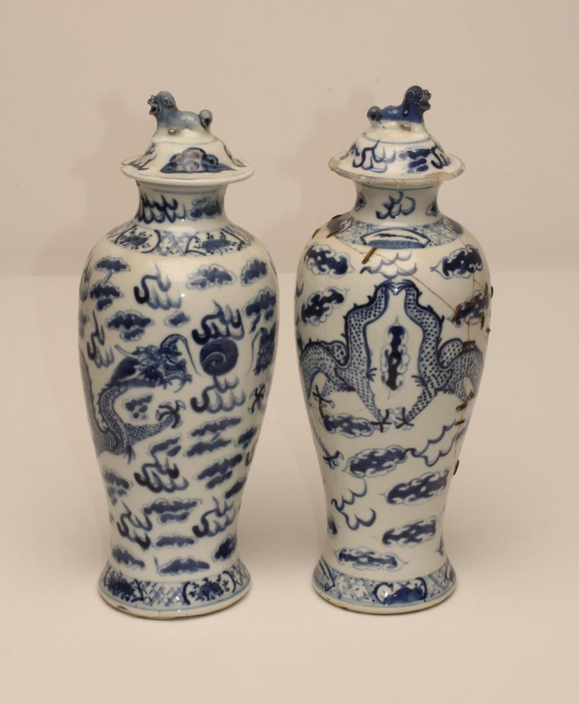 A PAIR OF CHINESE PORCELAIN VASES AND COVERS Image