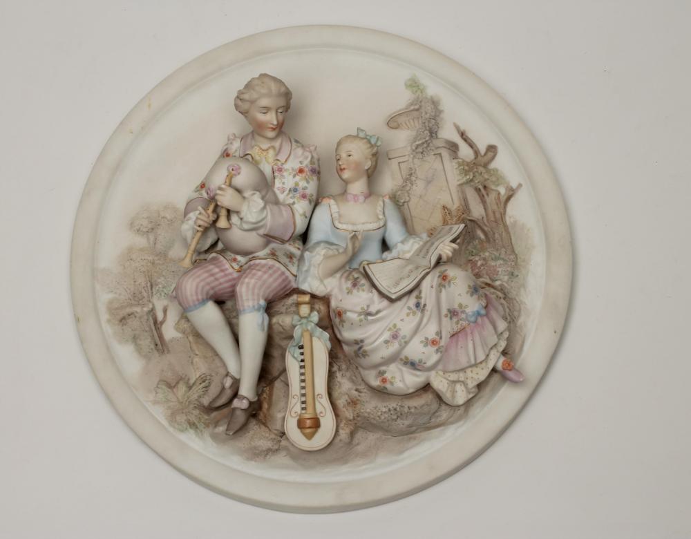 A GERMAN BISQUE PORCELAIN PLAQUE Image