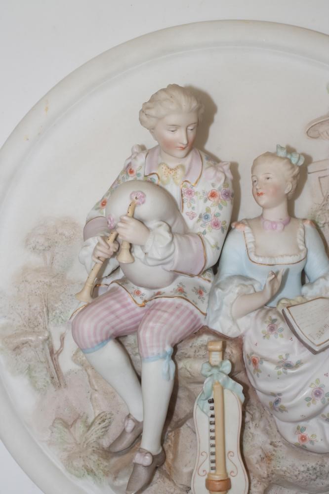 A GERMAN BISQUE PORCELAIN PLAQUE Image