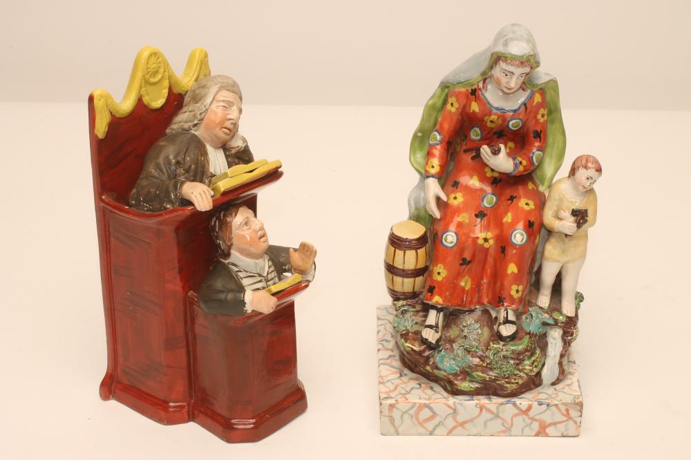A STAFFORDSHIRE PEARLWARE FIGURE Image