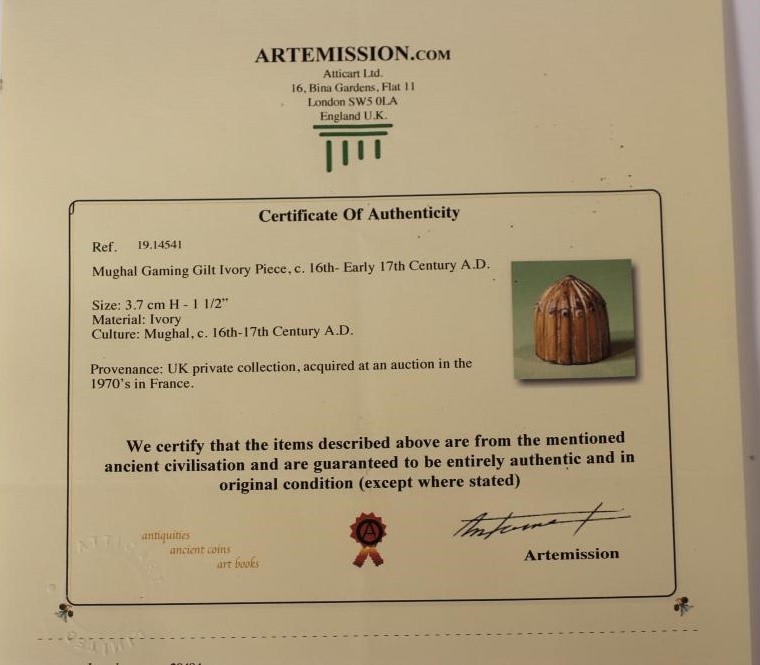 THREE MUGHAL IVORY GAMING COUNTERS Image