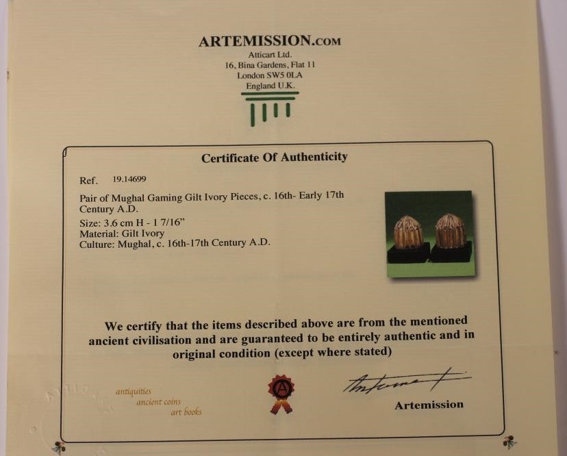 THREE MUGHAL IVORY GAMING COUNTERS Image