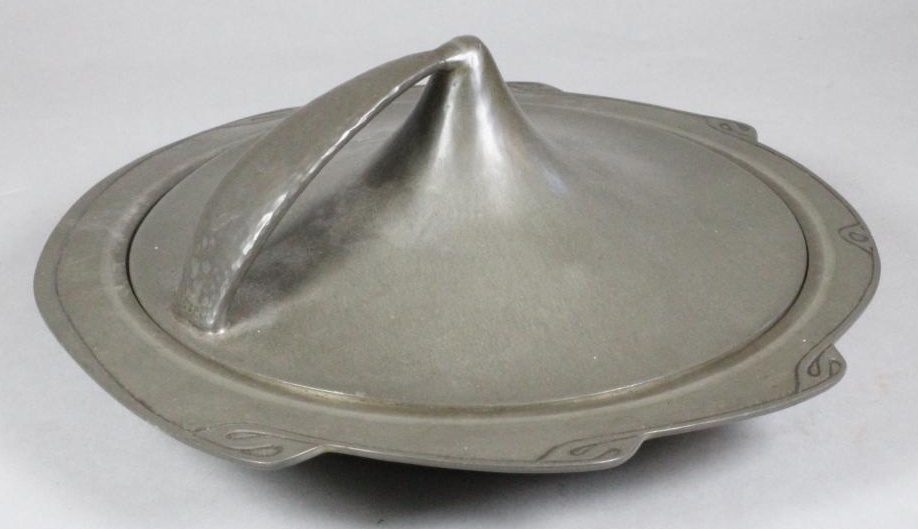 A LIBERTY & CO. PLANISHED PEWTER MUFFIN DISH AND COVER Image