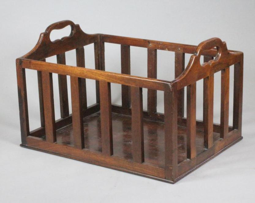 A MAHOGANY BOOK BASKET Image