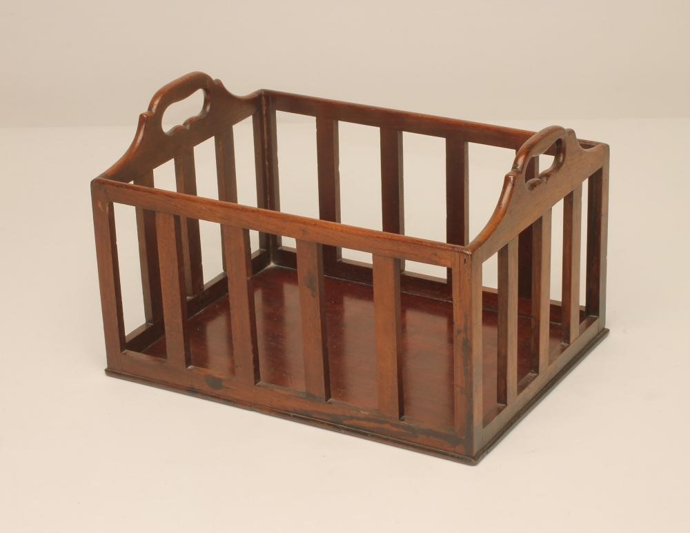 A MAHOGANY BOOK BASKET Image