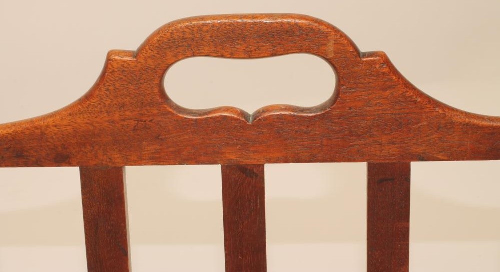A MAHOGANY BOOK BASKET Image