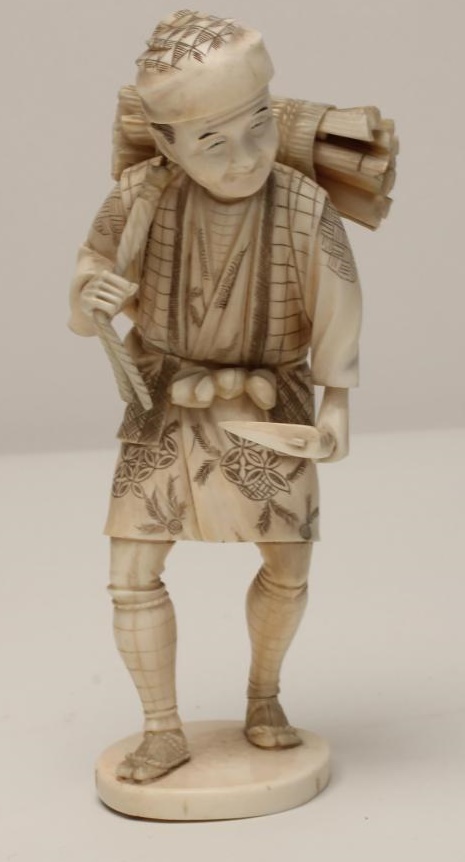 A JAPANESE IVORY OKIMONO Image