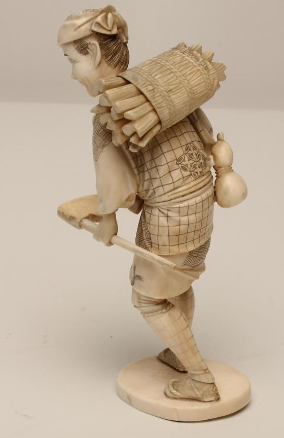 A JAPANESE IVORY OKIMONO Image