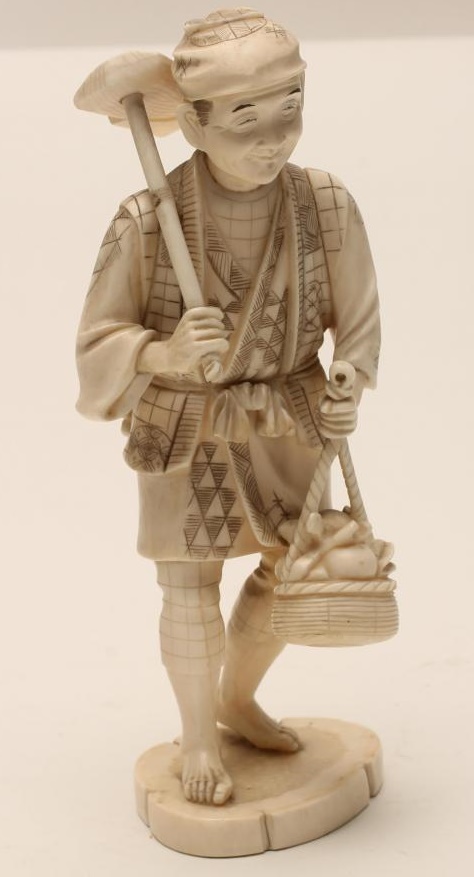 A JAPANESE IVORY OKIMONO Image