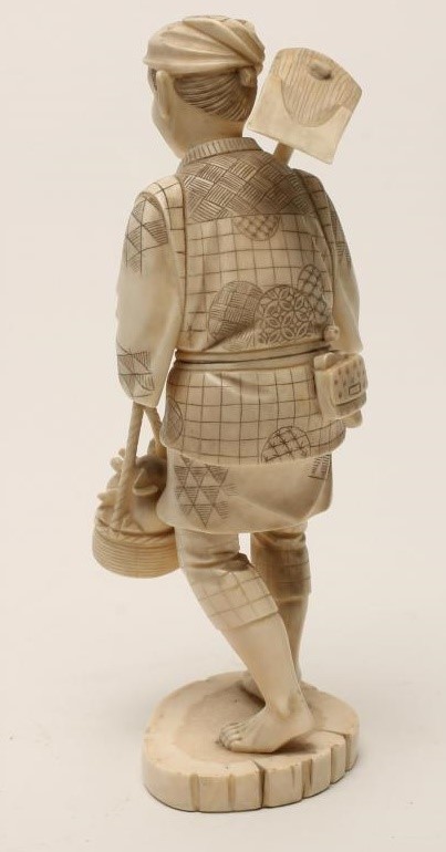 A JAPANESE IVORY OKIMONO Image