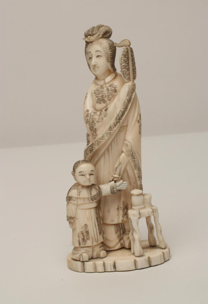 A JAPANESE IVORY OKIMONO Image