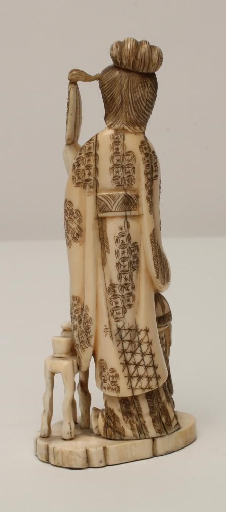 A JAPANESE IVORY OKIMONO Image