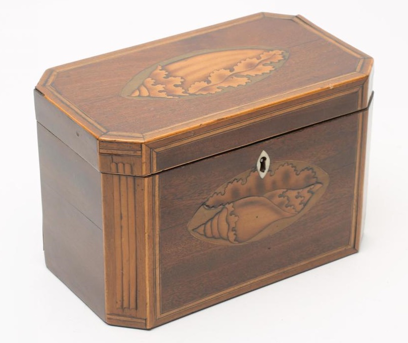 A LATE GEORGIAN MAHOGANY TEA CADDY of plain canted oblong form Image