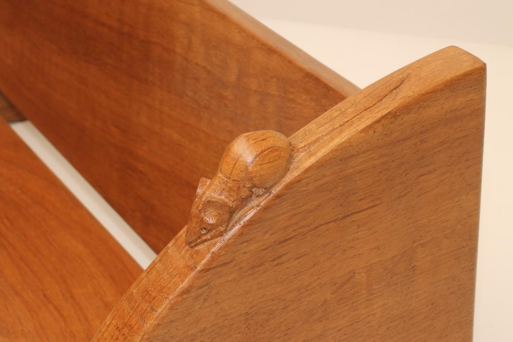 A ROBERT THOMPSON ADZED OAK BOOK TROUGH of oblong form with crescent shaped ends on bracket feet Image