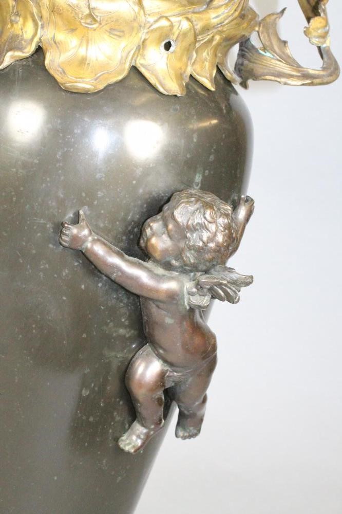 A FRENCH BRONZED METAL GARNITURE VASE Image
