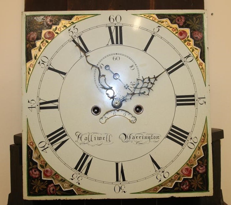 A MAHOGANY LONGCASE CLOCK signed Halliwell Image