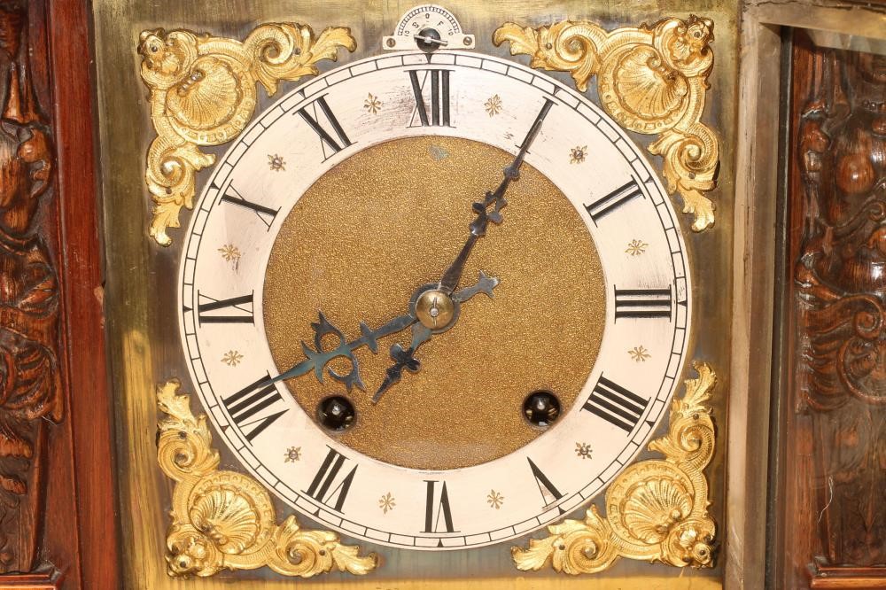 A GERMAN WALNUT CASED MANTEL CLOCK Image