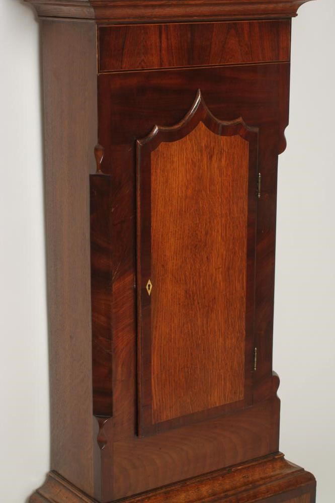 AN OAK AND MAHOGANY LONGCASE signed H. Webster Image