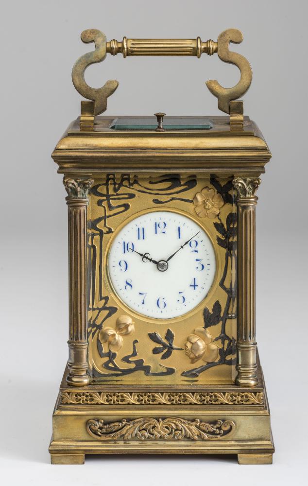 A GILT BRASS CASED CARRIAGE CLOCK Image