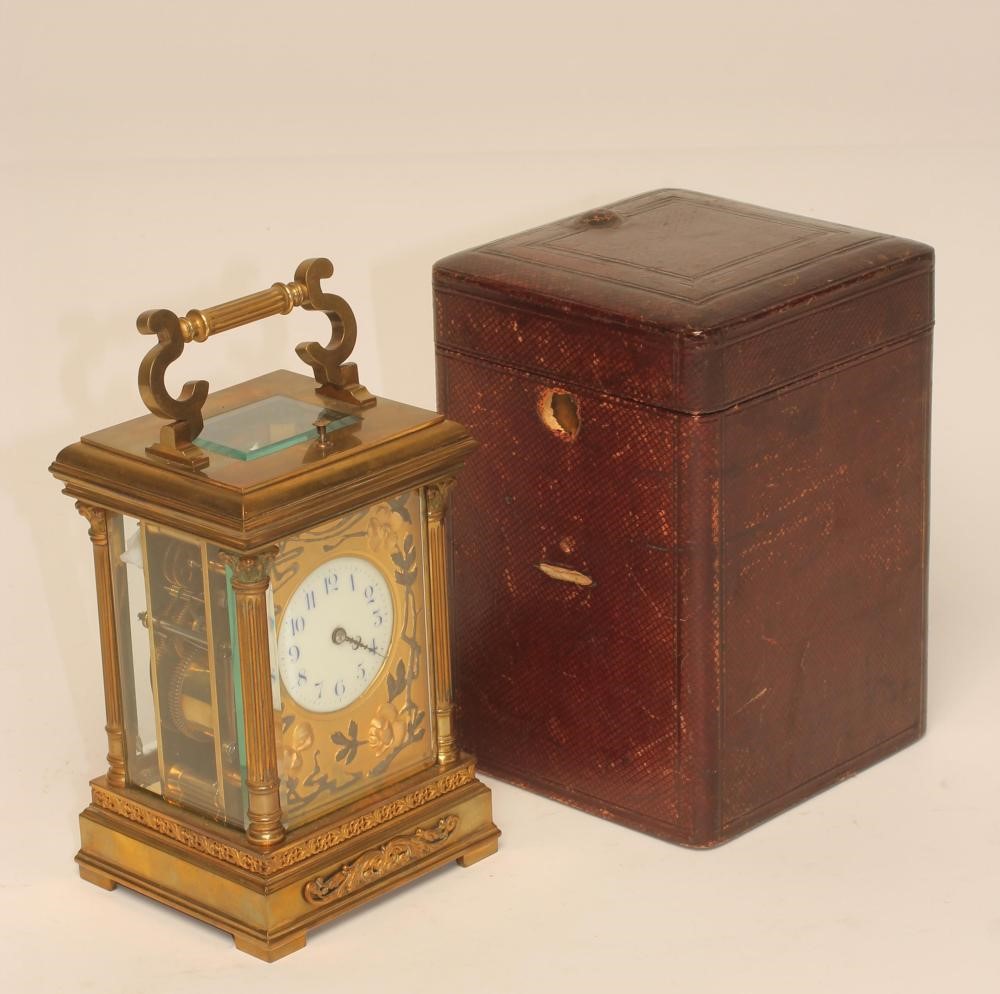 A GILT BRASS CASED CARRIAGE CLOCK Image