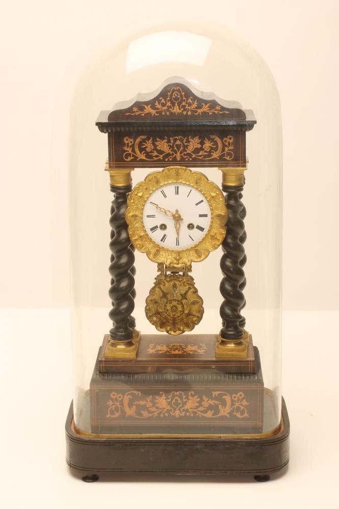 A FRENCH EBONISED PORTICO CLOCK Image