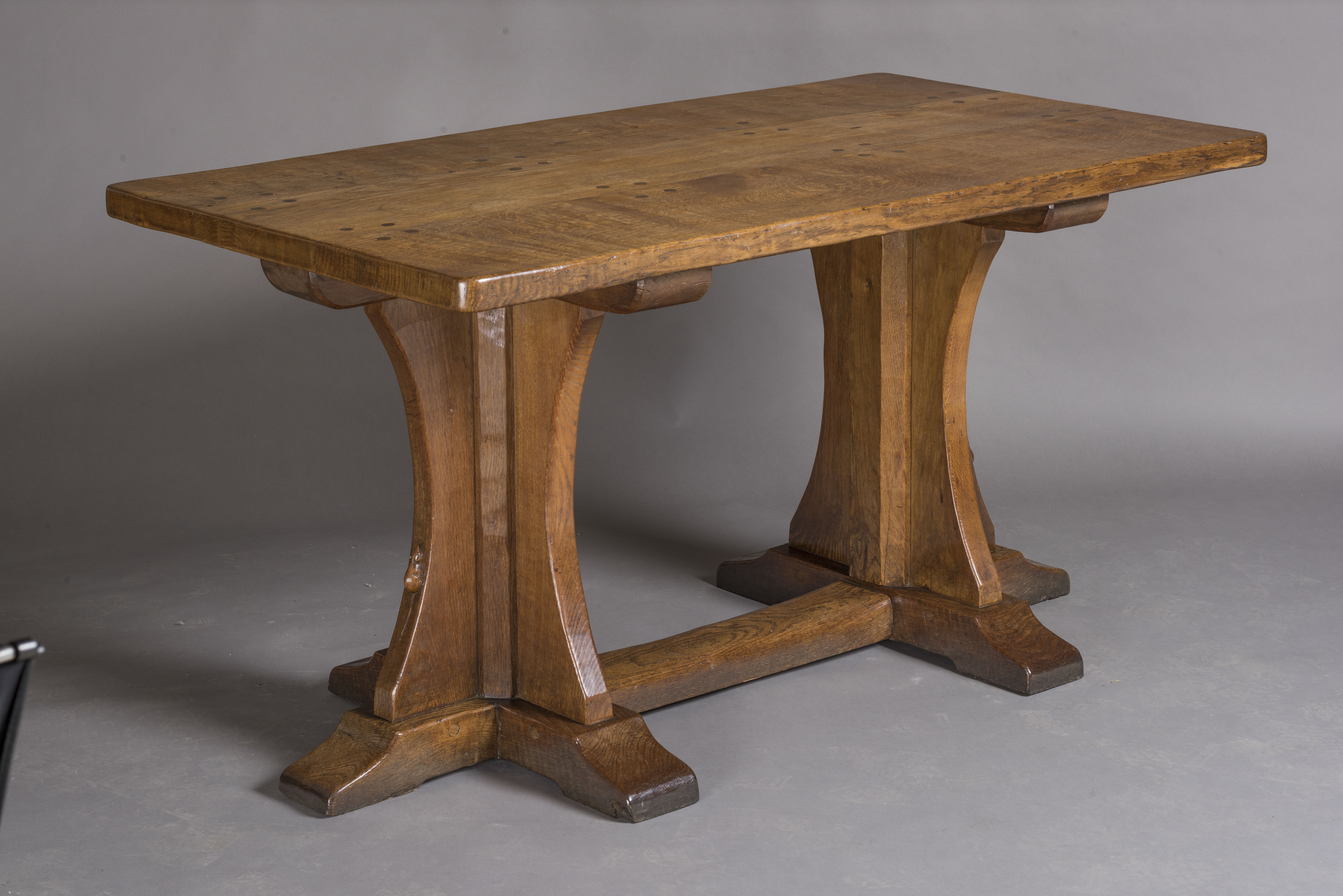 A ROBERT THOMPSON ADZED OAK REFECTORY TABLE Image