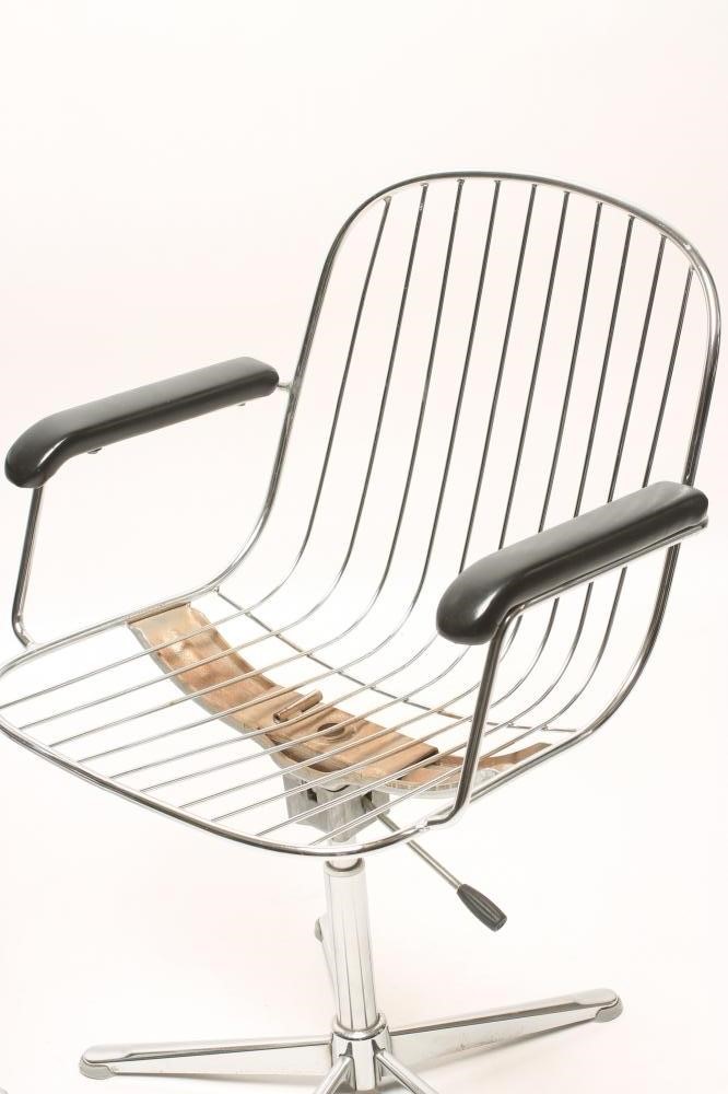 A PAIR OF CHROME FRAMED SWIVEL CHAIRS Image