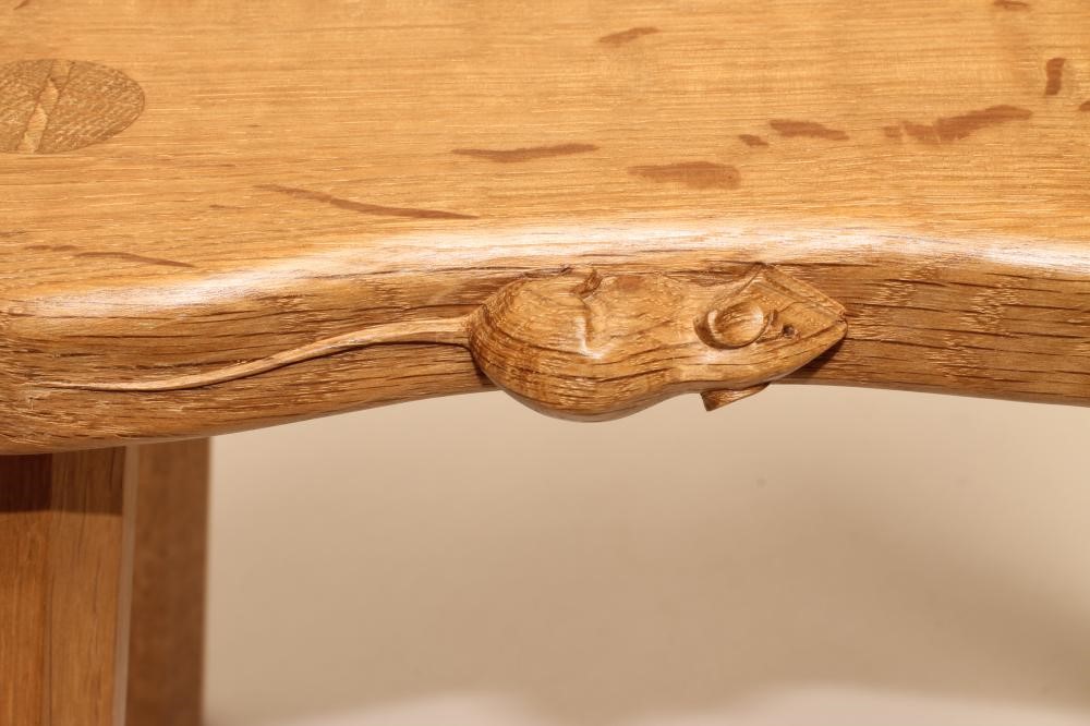 A ROBERT THOMPSON ADZED OAK STOOL of waisted rounded oblong form Image