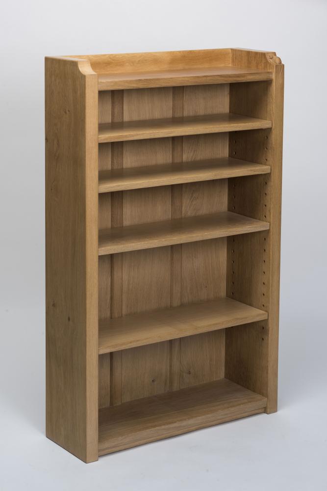 A ROBERT THOMPSON OAK OPEN BOOKCASE of oblong form with galleried surmount and adjustable shelving Image