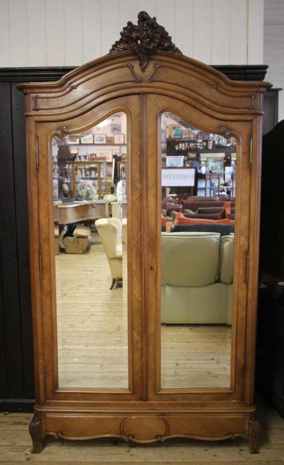 A FRENCH WALNUT ARMOIRE Image