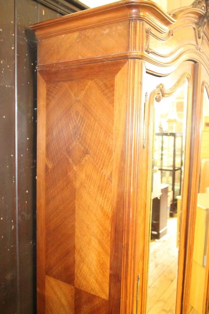 A FRENCH WALNUT ARMOIRE Image
