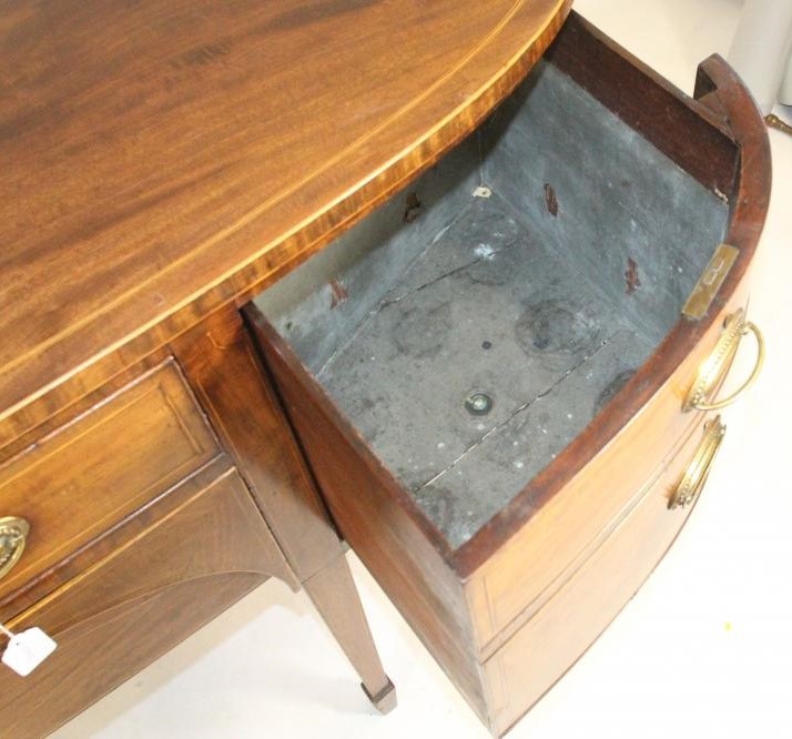 A GEORGIAN MAHOGANY SIDEBOARD Image