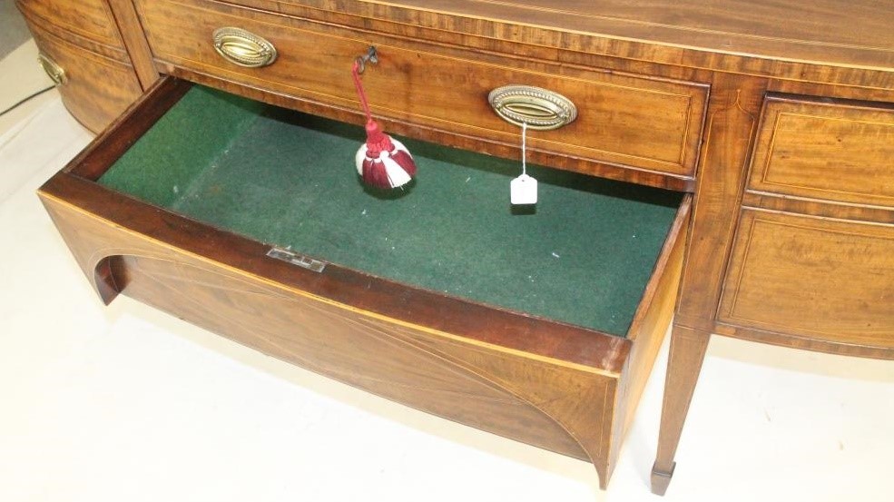 A GEORGIAN MAHOGANY SIDEBOARD Image