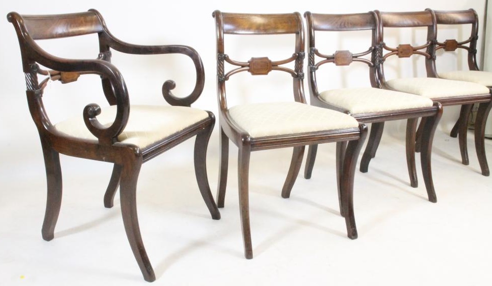 A SET OF FIVE REGENCY MAHOGANY DINING CHAIRS including an elbow chair Image