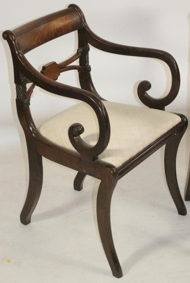 A SET OF FIVE REGENCY MAHOGANY DINING CHAIRS including an elbow chair Image