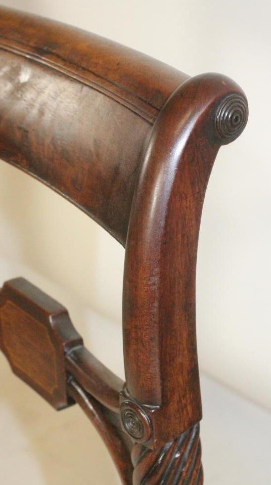 A SET OF FIVE REGENCY MAHOGANY DINING CHAIRS including an elbow chair Image