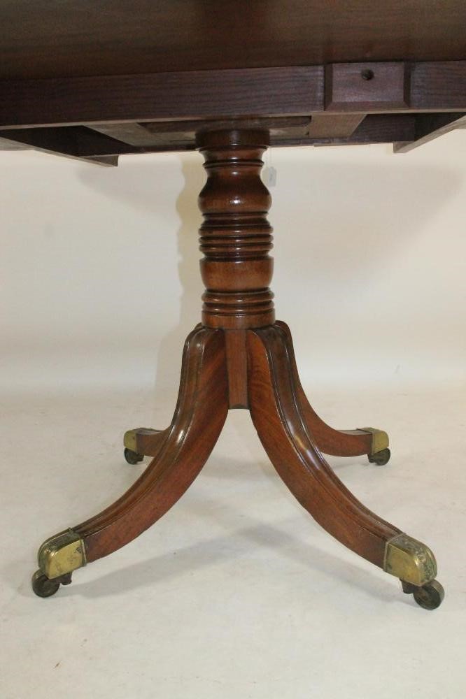 A MAHOGANY BREAKFAST TABLE Image