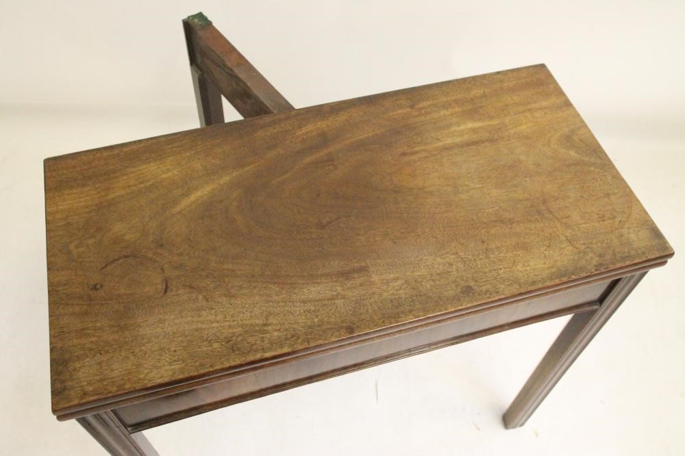 A GEORGIAN MAHOGANY FOLDING TEA TABLE Image