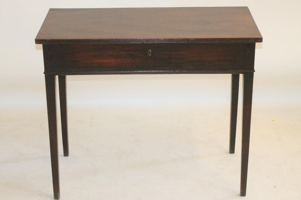 A RARE AND UNUSUAL GEORGIAN MAHOGANY FOLDING WRITING TABLE Image