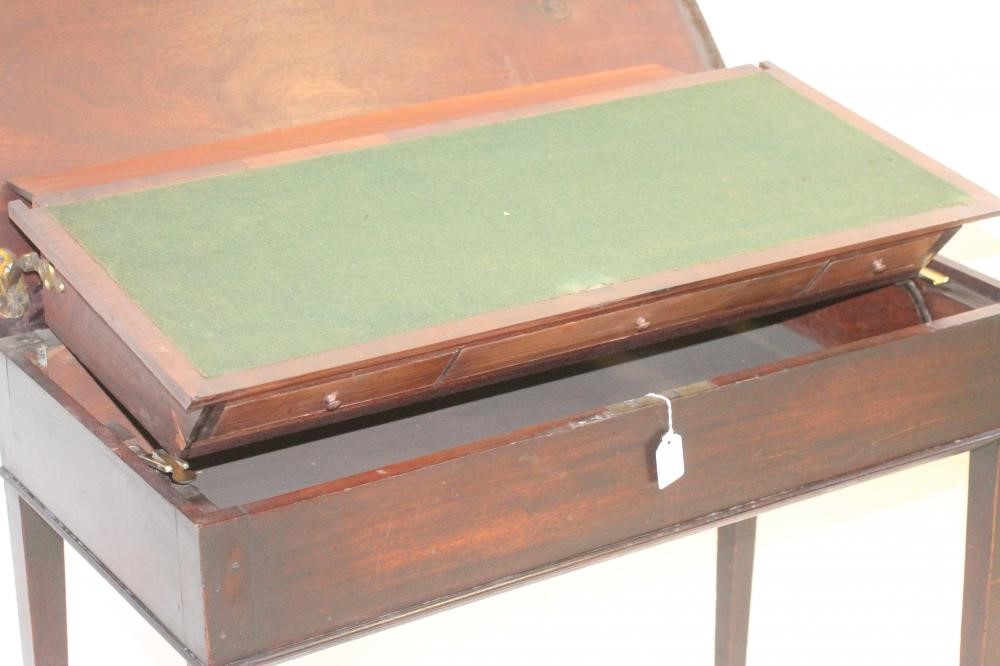 A RARE AND UNUSUAL GEORGIAN MAHOGANY FOLDING WRITING TABLE Image