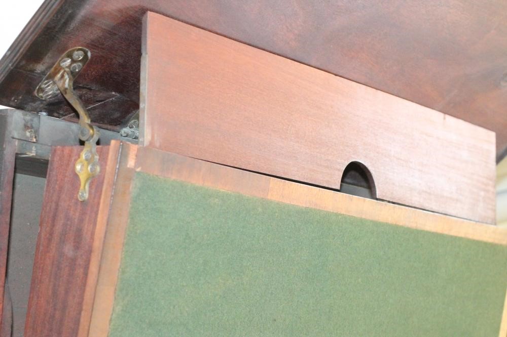 A RARE AND UNUSUAL GEORGIAN MAHOGANY FOLDING WRITING TABLE Image