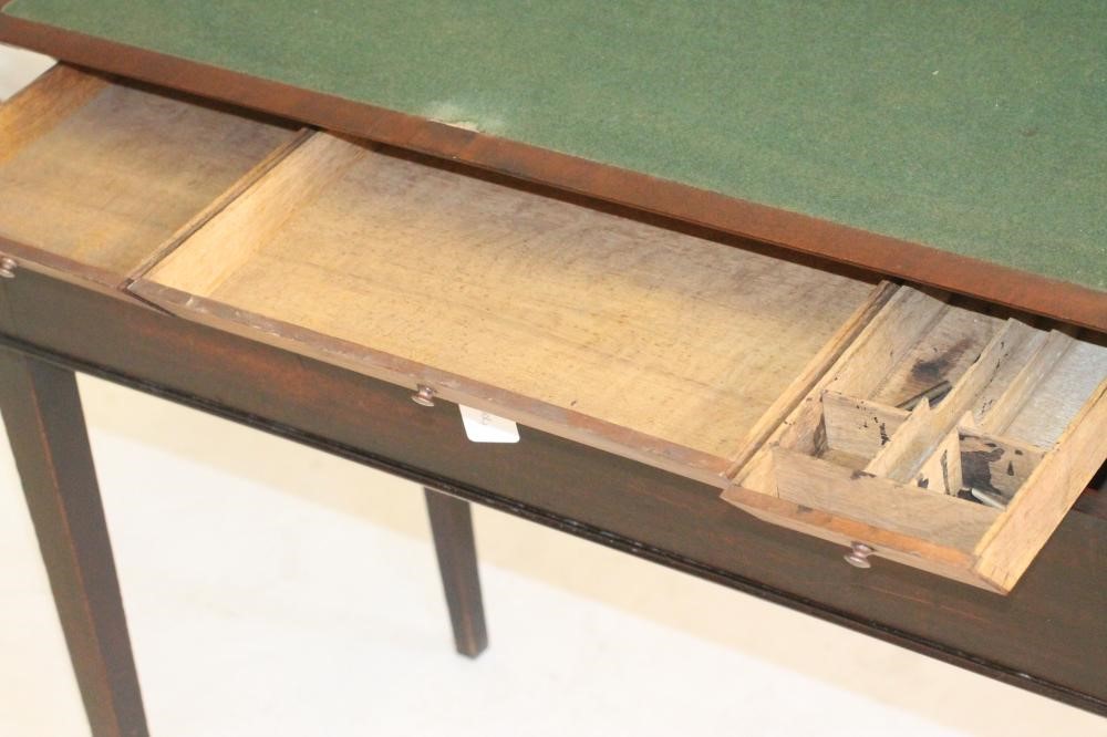 A RARE AND UNUSUAL GEORGIAN MAHOGANY FOLDING WRITING TABLE Image
