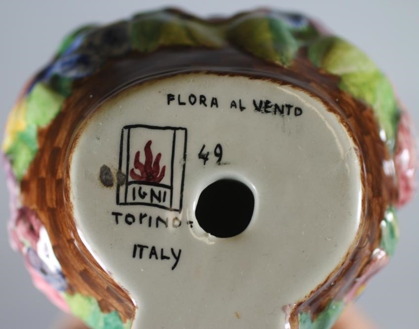 AN ART DECO IGNI OF TORINO EARTHENWARE FIGURE of a young flower seller wearing a green headscarf and Image