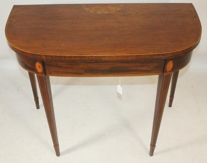 A GEORGIAN MAHOGANY FOLDING CARD TABLE Image