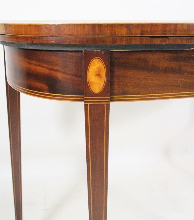 A GEORGIAN MAHOGANY FOLDING CARD TABLE Image