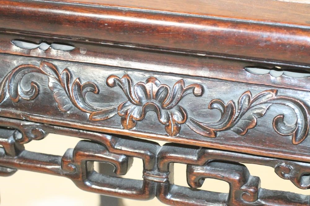 A CHINESE PADOUK WOOD JARDINIERE STAND Image