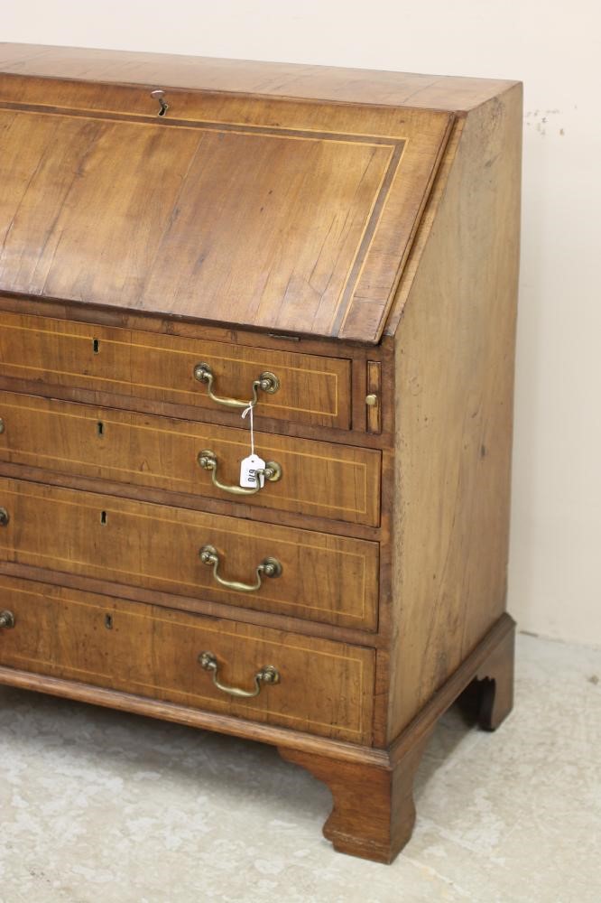 A GEORGIAN WALNUT BUREAU Image